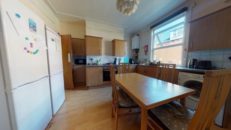 Photo 1: Kitchen/Dining Area