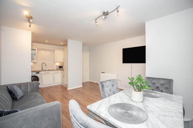 Photo 1: Open plan living area 