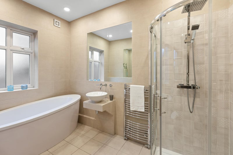 Photo 1: Luxury Bathroom with Oval Tub & Separate Power Shower