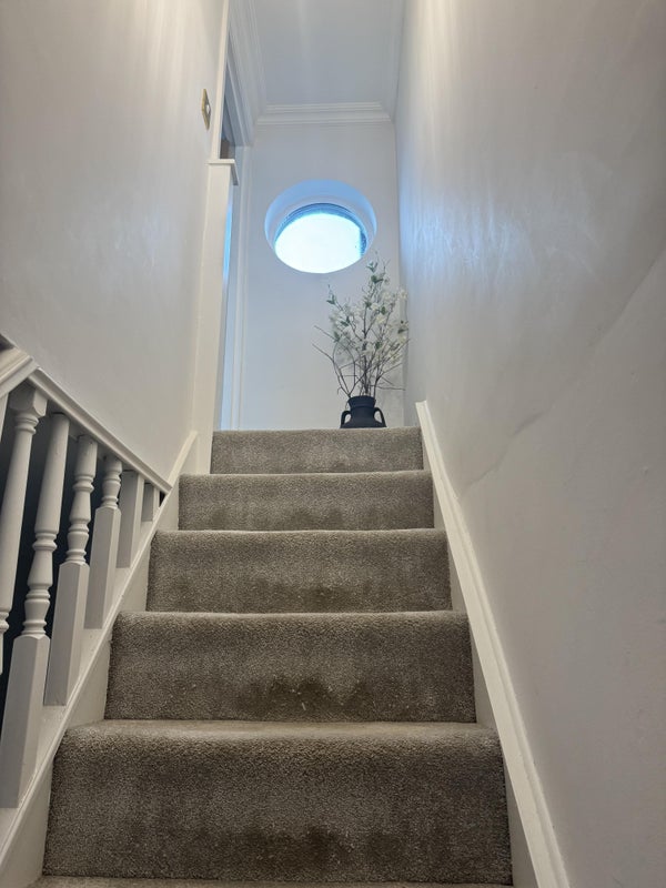 Photo 1: Stairs leading to bedroom 