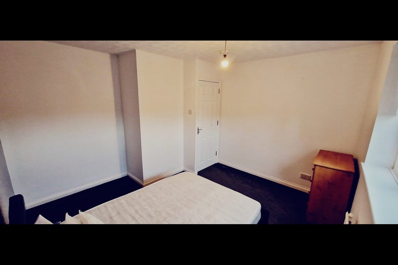 Photo 1: first bedroom angle 2 