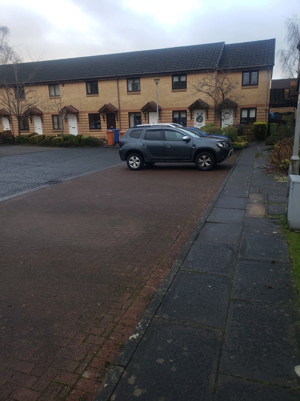 Photo 1: house and the carpark