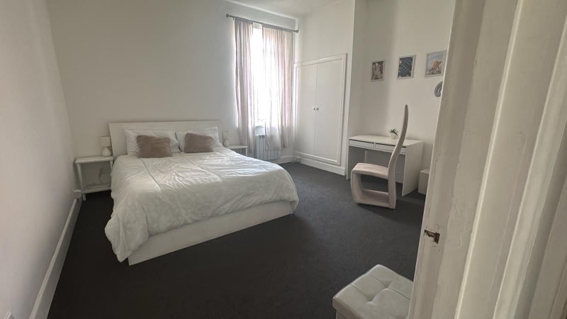 Photo 1: DBL bedroom with king size bed, lots of storage