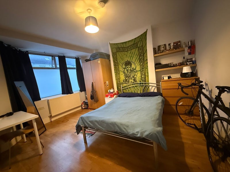 Photo 1: Very large bedroom with large bay window