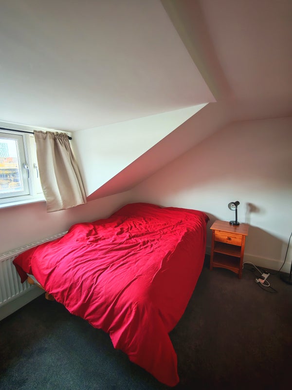 Photo 1: Attic room double bed