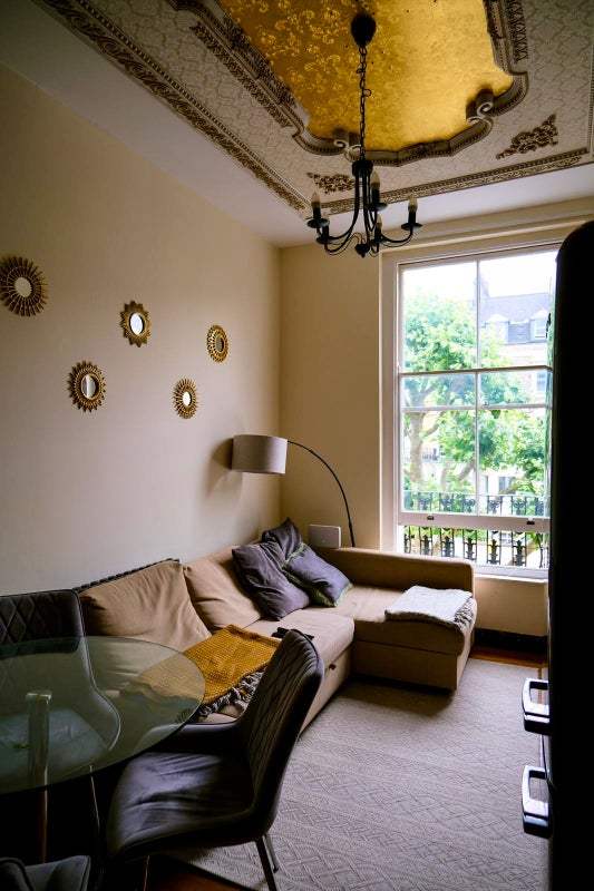 Photo 1: Living room and adjoining balcony