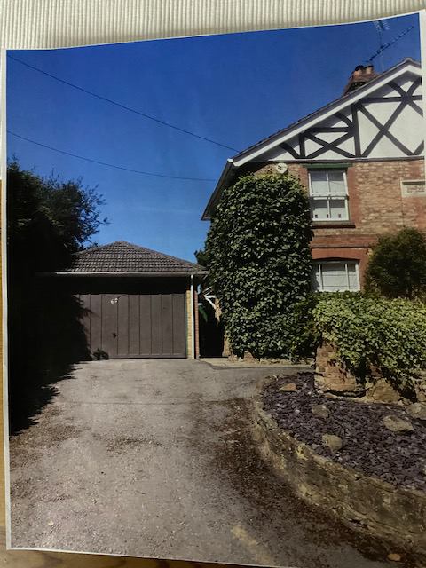 Photo 1: Off street parking