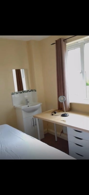 Photo 1: Spacious desk with storage and a private wash basin, plenty of natural light