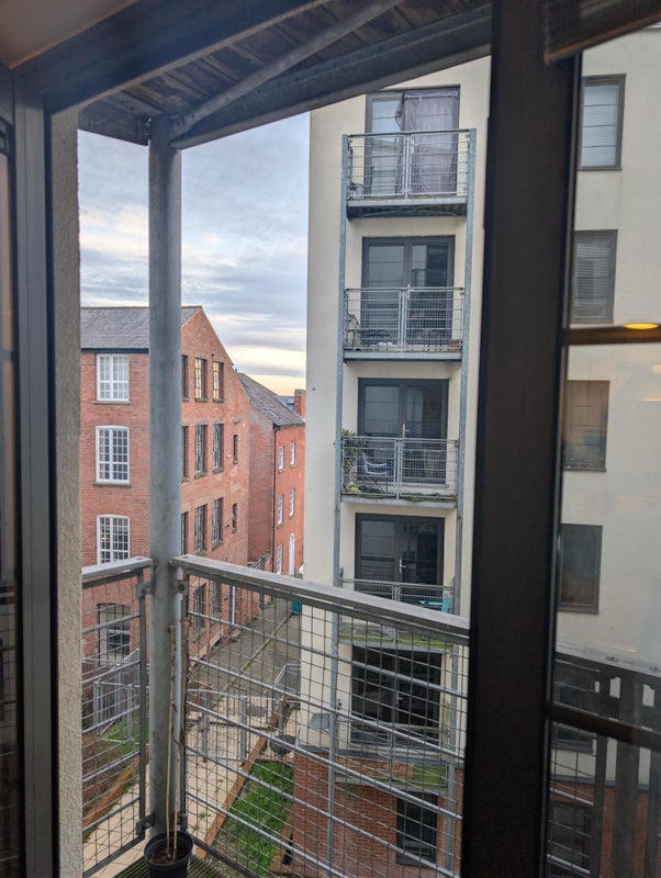 Photo 1: Balcony view