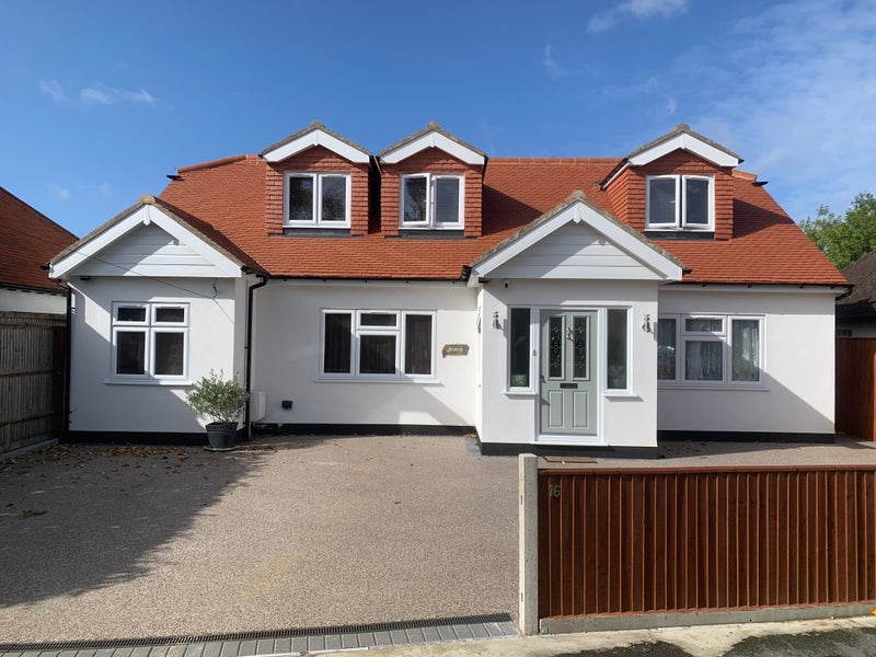 Photo 1: House Front