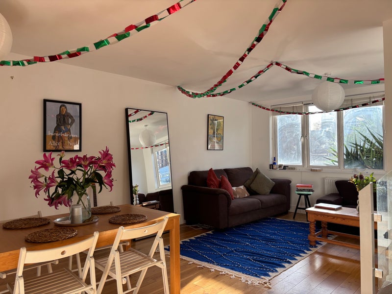 Photo 1: Living room on the middle floor