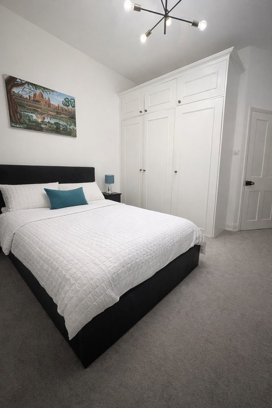 Photo 1: First Bedroom 