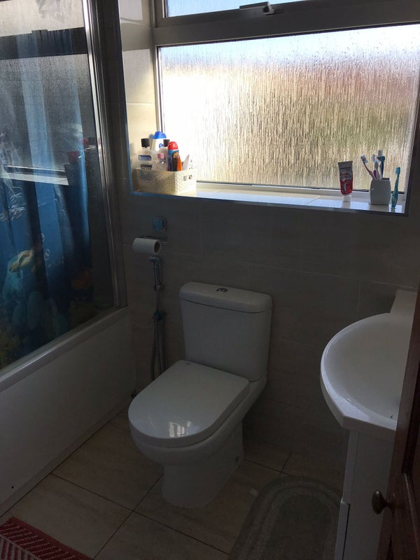 Photo 1: Sharing Bathroom for Room 1.