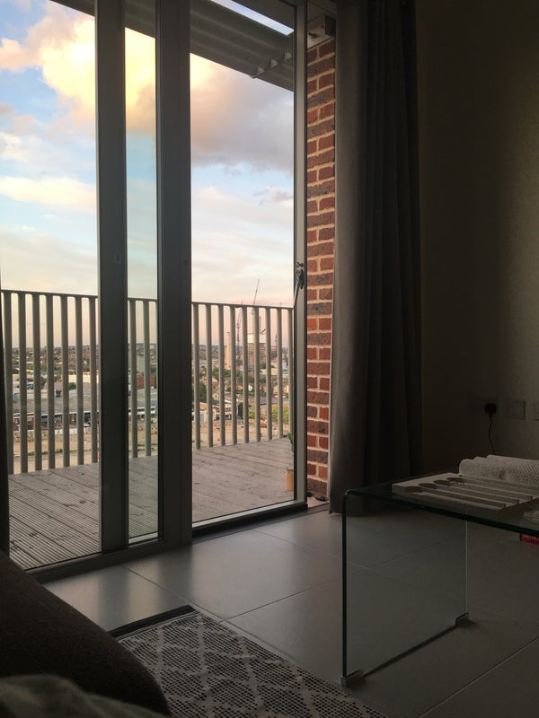 Photo 1: View of balcony from living space