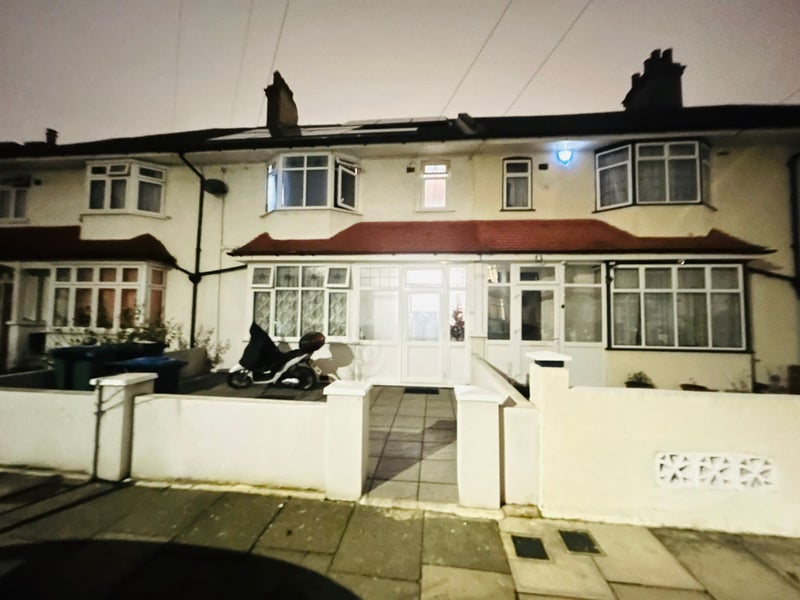 Photo 1: House Front