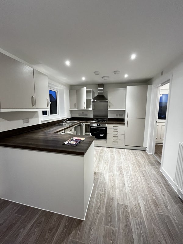 Photo 1: Kitchen, with walk-in utility to the right