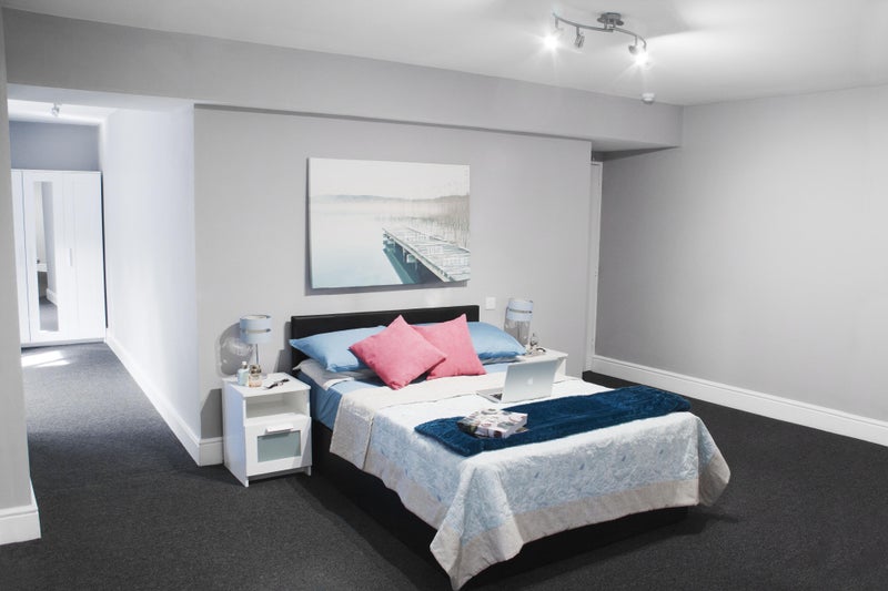 Photo 1: The bed is a storage bed so lots of additional space underneath