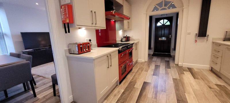 Photo 1: Adjacent sitting/dining room