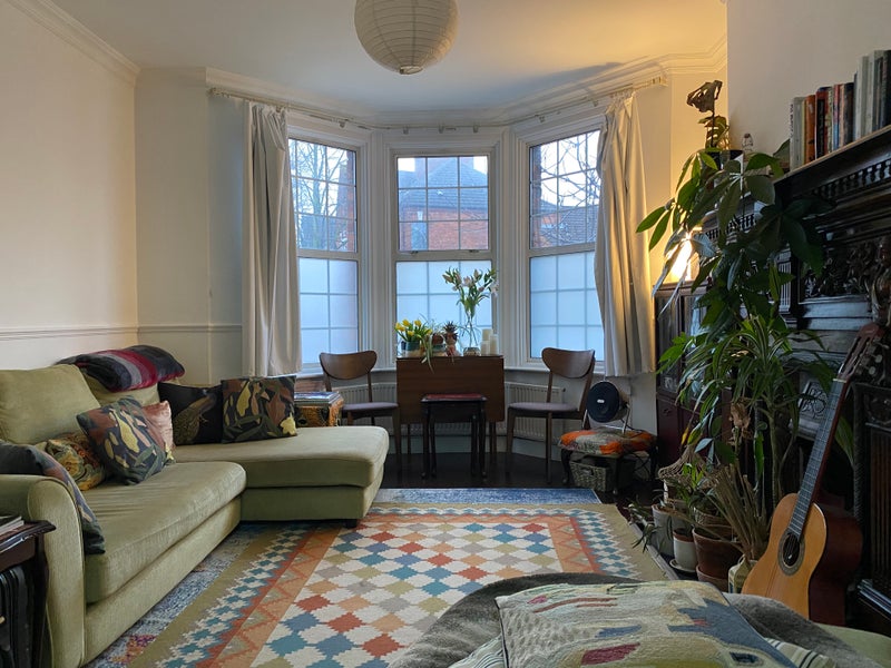 Photo 1: Private living-room area.