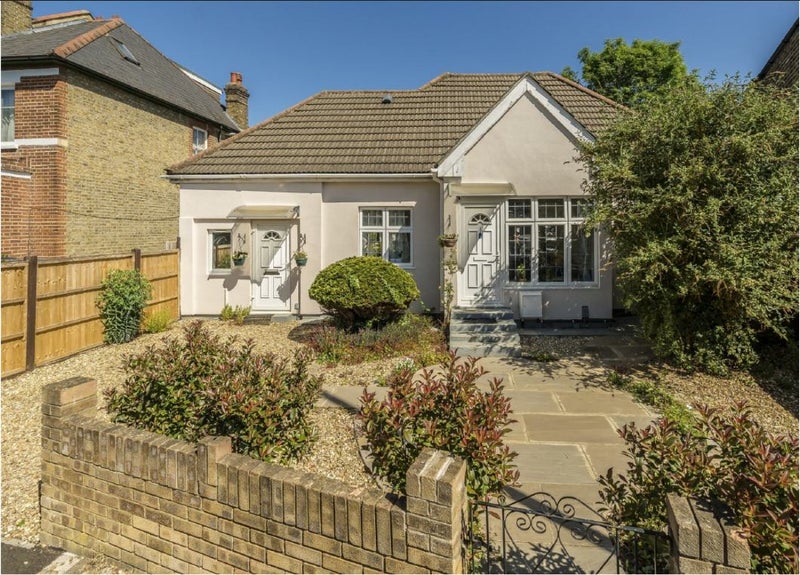 Photo 1: Front view of the property