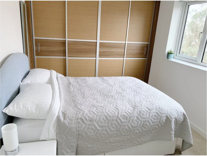 Photo 1: Firm mattress with memory foam topper.