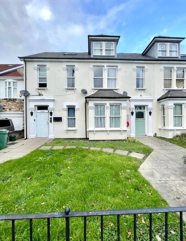 Photo 1: Front of property