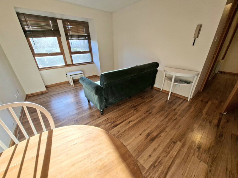 Photo 1: Living Room with dining area