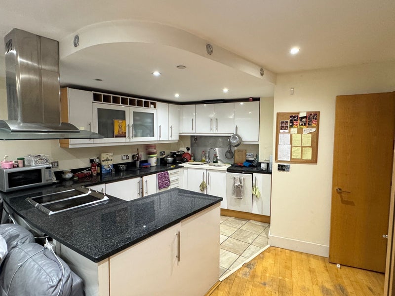 Photo 1: Shared Kitchen