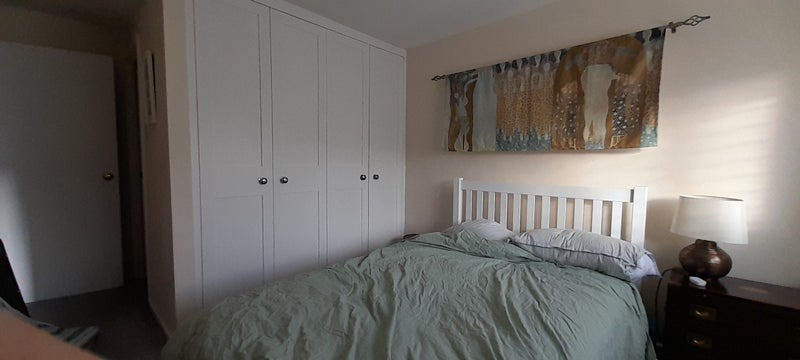 Photo 1: Double bed, room has wardrobe and ensuite bathroom with shower
