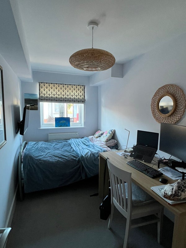 Photo 1: The room to be let.  Has wardrobe with drawers, desk, 4'6 bed and tv