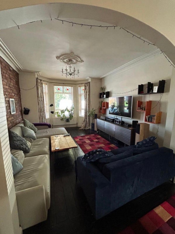 Photo 1: Shared living room 