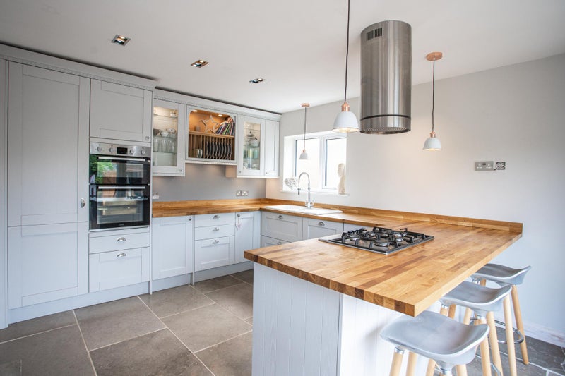 Photo 1: Large kitchen with lots of natural light