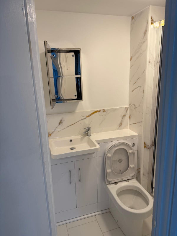Photo 1: En-Suite Toilet