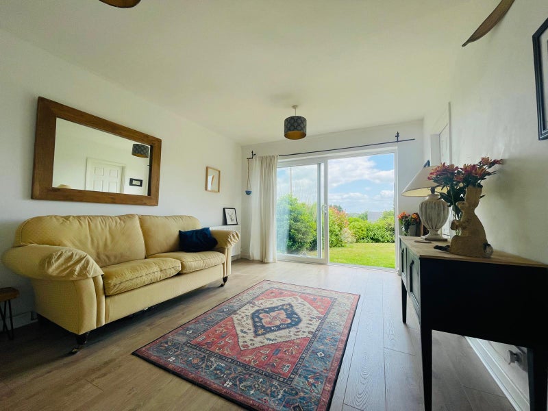 Photo 1: Sitting Room