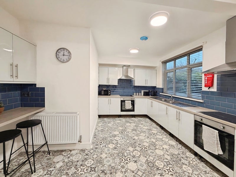 Photo 1: Shared kitchen