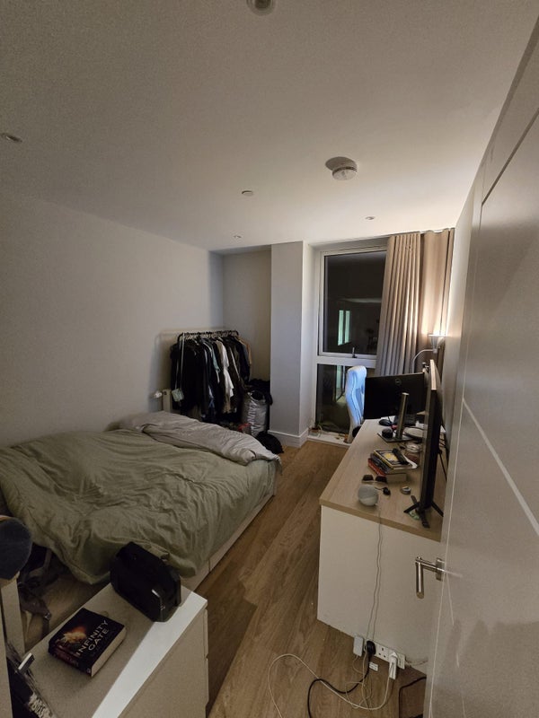 Photo 1: Room furnished