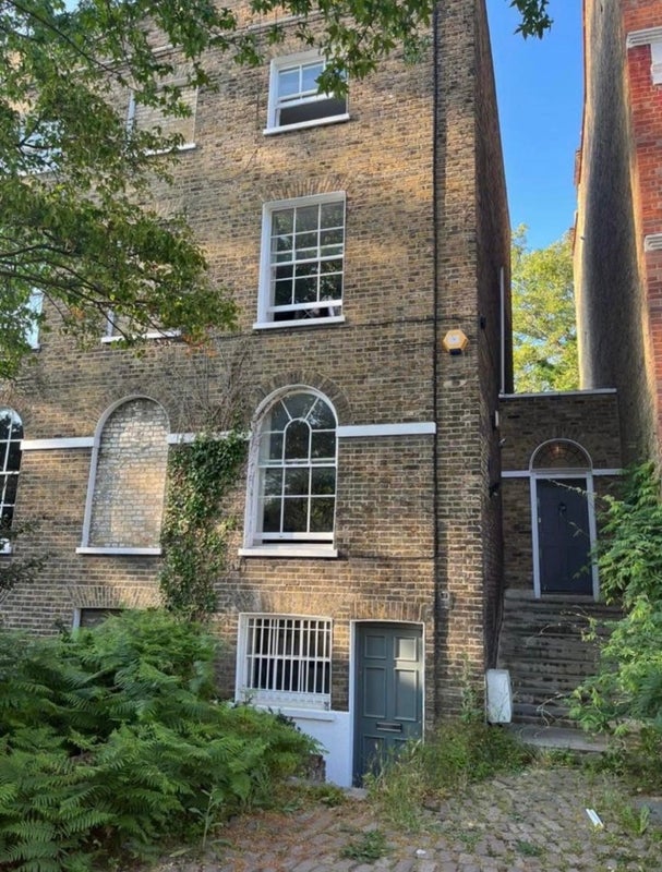 Photo 1: Outside of house 