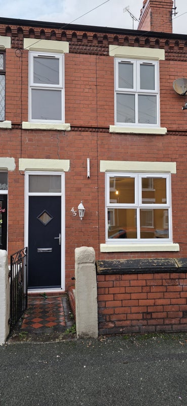 Photo 1: Front new double glazing