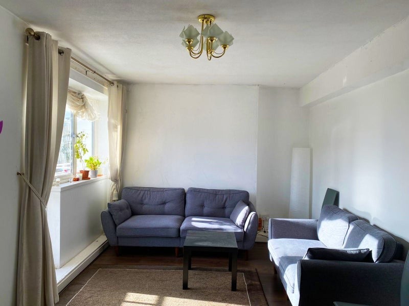 Photo 1: Spacious living room with attached balcony