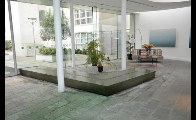 Photo 1: Building Concierge