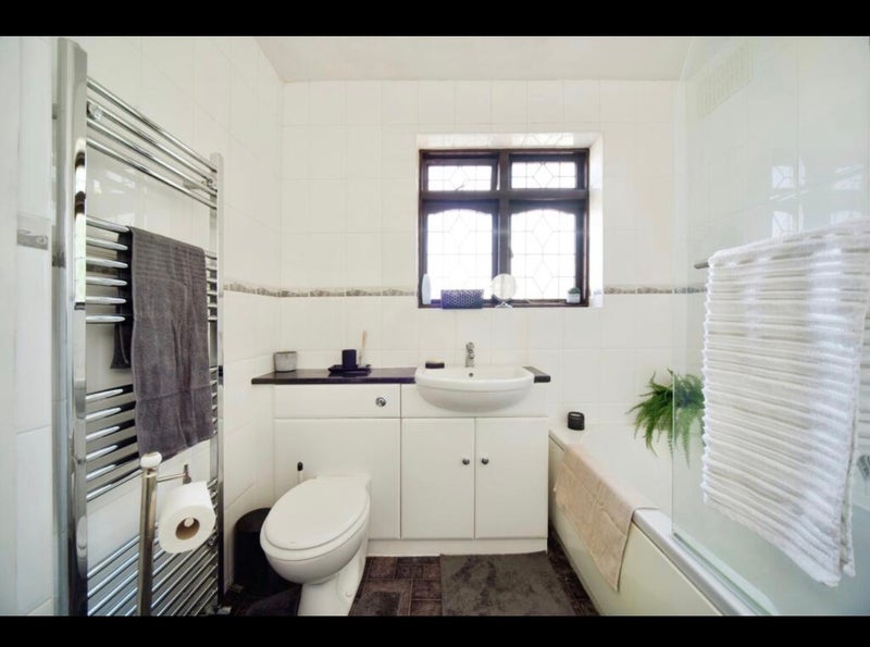 Photo 1: Shared bathroom