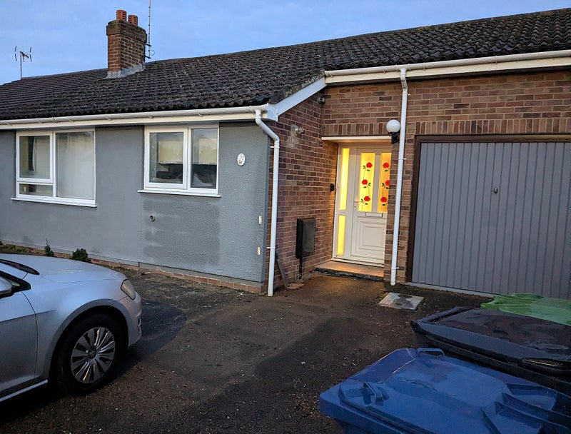 Photo 1: Front of house