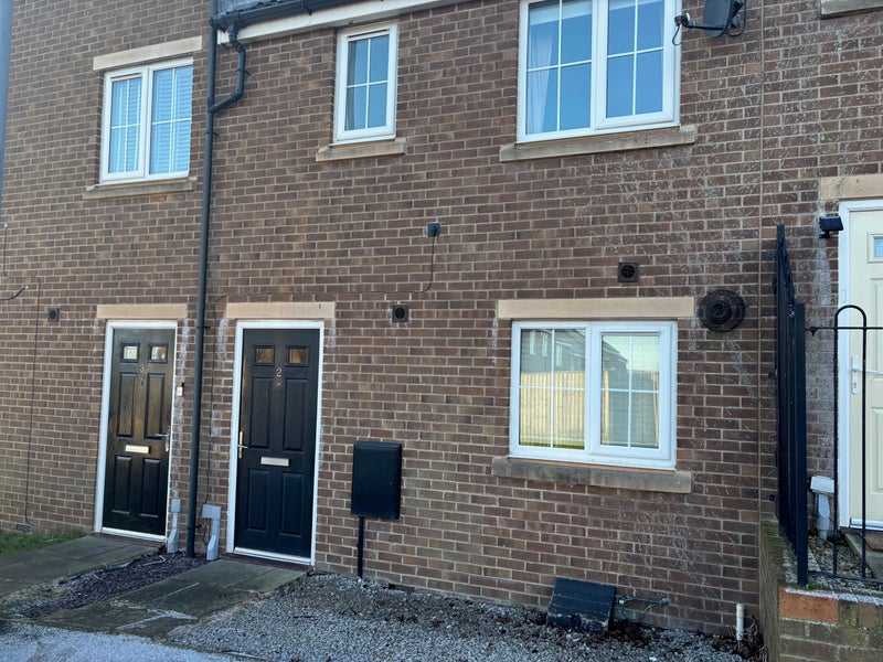 Photo 1: Front of house