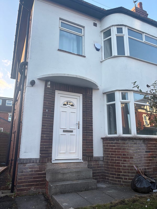 Photo 1: Front of house 