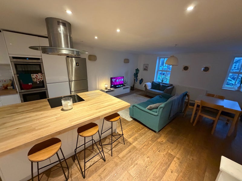 Photo 1: Living room and Kitchen area 