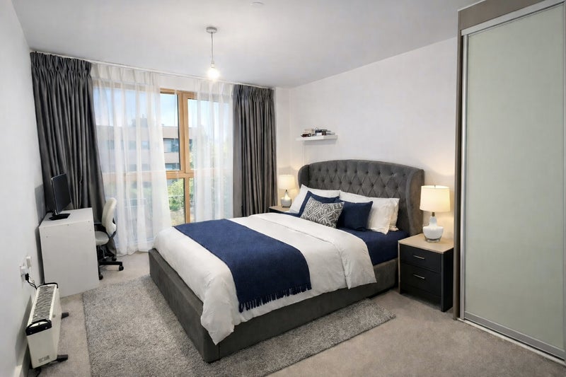 Photo 1: Bedroom with study/work space 