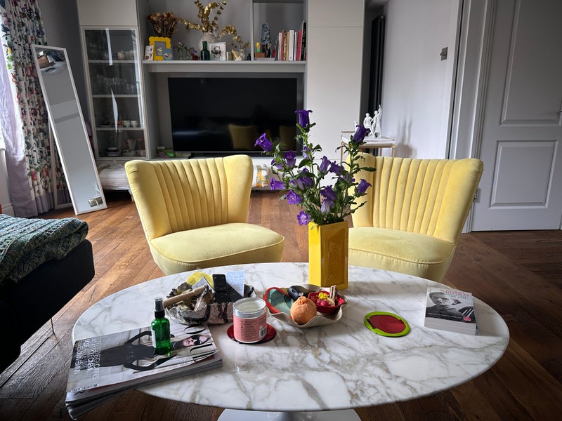 Photo 1: Glimpse of the living room – TV and the comfiest sofa (pictured from my POV)