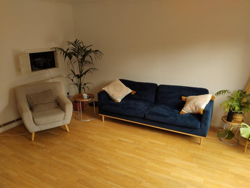 Photo 1: Living room, coffee table a rug to finish.