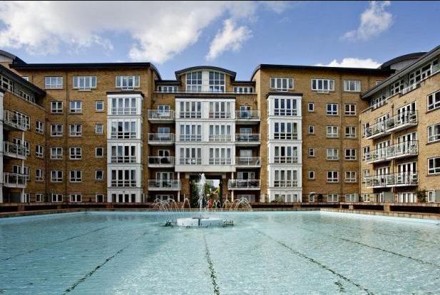 Photo 1: Exterior Building