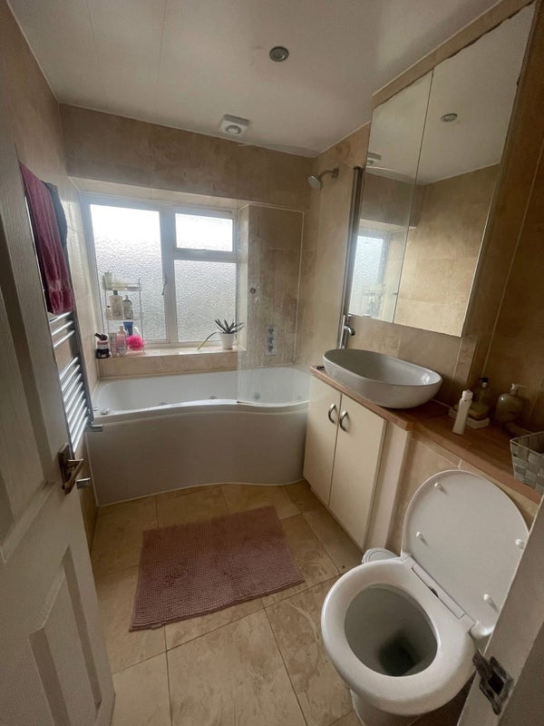 Photo 1: Bathroom shared with 2 other girls. Very clean and has personal storage available 